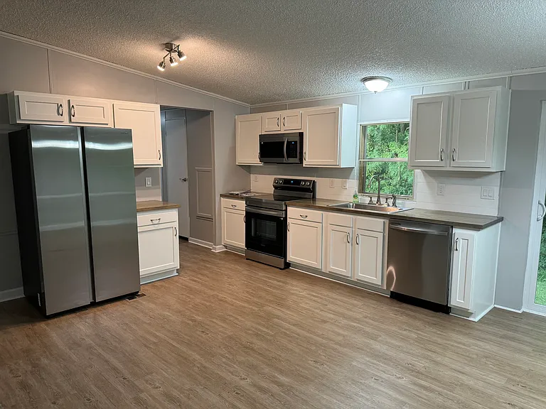 6912 Frank Ott Rd — Photo 11