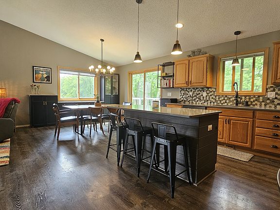 Open concept kitchen with quartz countertops