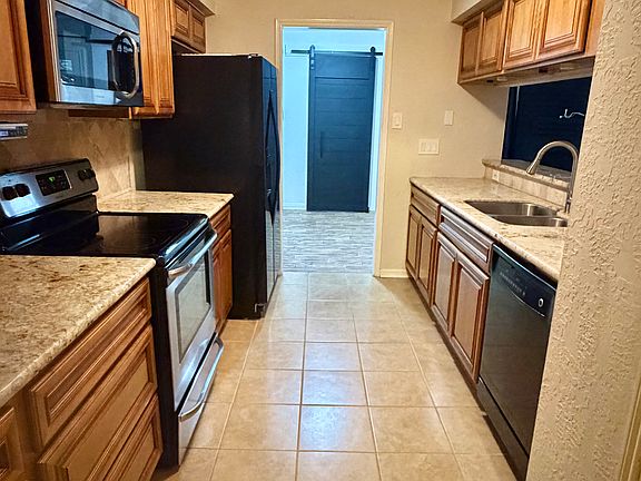 Kitchen including pantry closet