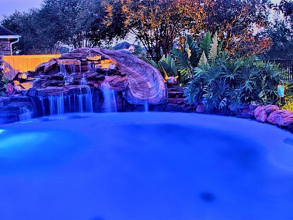 Pool lights provide ambiance at night