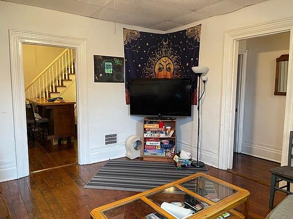 We came from the doorway on the right into the LivingRoom looking into the Dining Room .