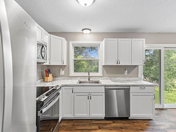 3rd image of 24927 Narcissus St NW