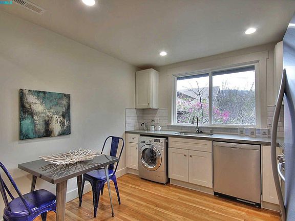 kitchen has washer/dryer combo unit, dishwasher, etc