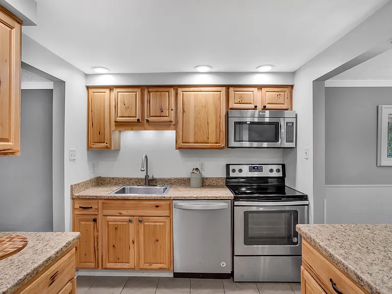Kitchen with Large Island and Oversized Pantry.