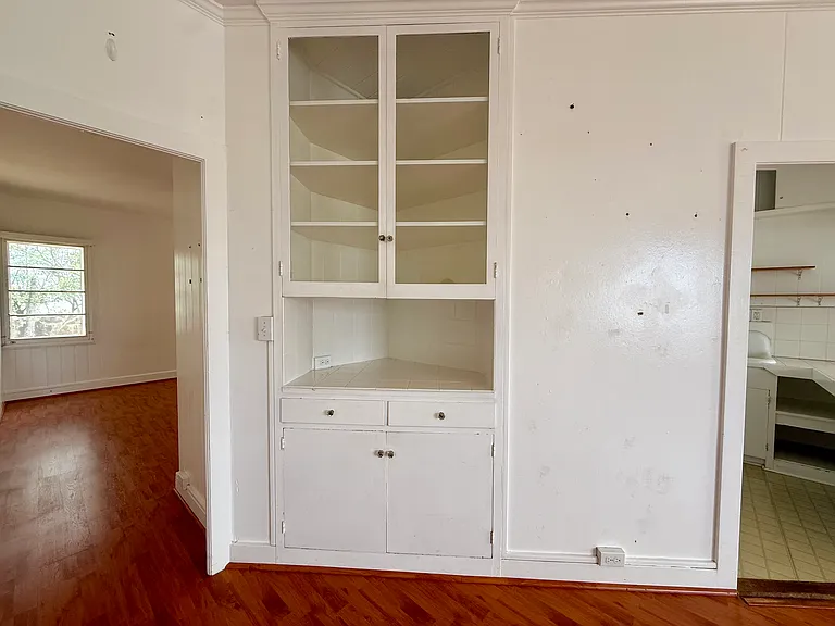 Convenient built-in storage space located off the kitchen