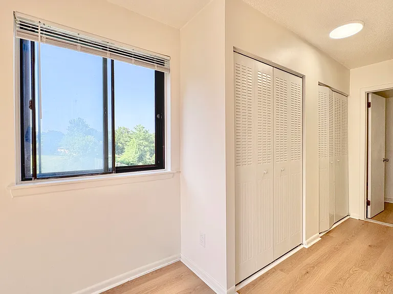 Primary suite with two double-door closets