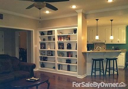 Built In Bookcases & Granite Countertops : Built in bookcases are a great luxury. Bar seating with p