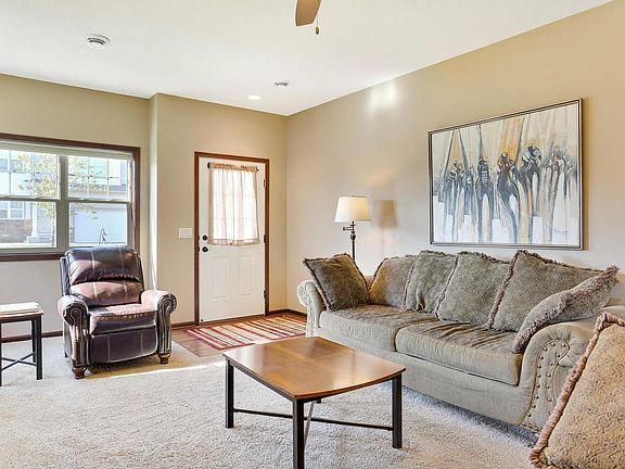 Lots of light comes into the bright southern facing entry of this home.  The windows have energy efficient cellular blinds.
