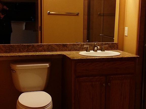 Guest bathroom feature a shower.