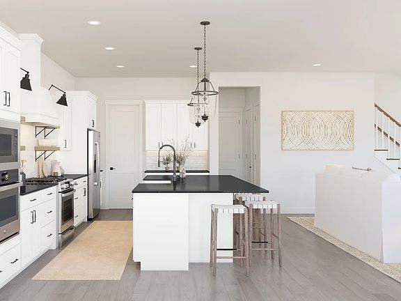 Kitchen with quartz island countertop