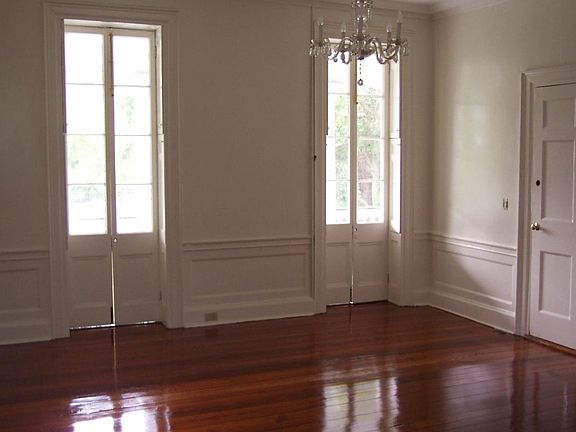 Living room with door to hall and french doors to porch