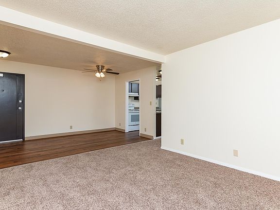 Raleigh Scholls Apartments ; Living Room Looking at Dining Room