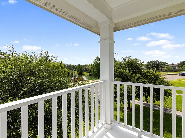 Primary suite balcony overlooking the lake