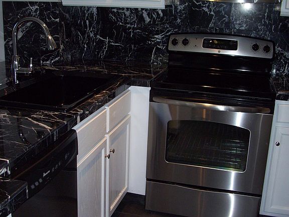 All nice newer appliances, glass top stove, microwave, fridg