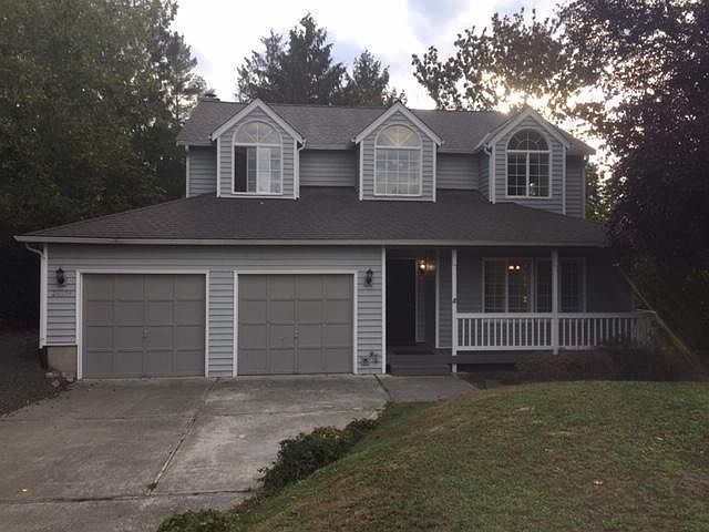 House exterior, showing 2 car garage