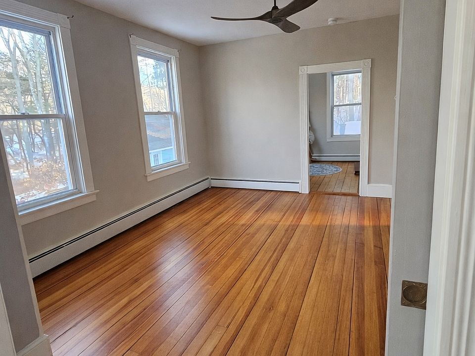 living room/dining room space w/ pocket door for privacy.