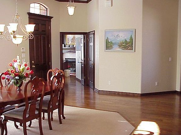 formal dining and entry with study in background