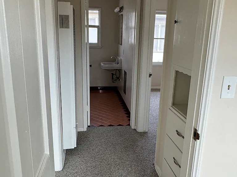 Hallway with storage and brand new smoke/CO2 detectors