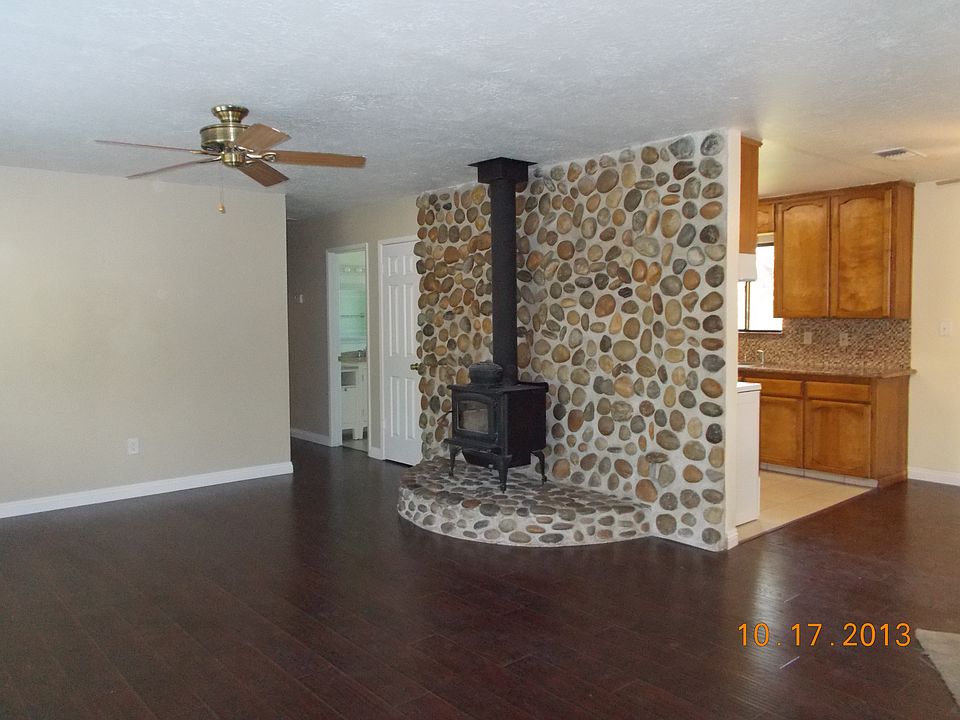 Living room.  New floors extend to hall and dining room.