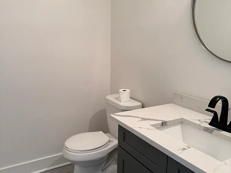 Down stairs 1/2 bathroom.