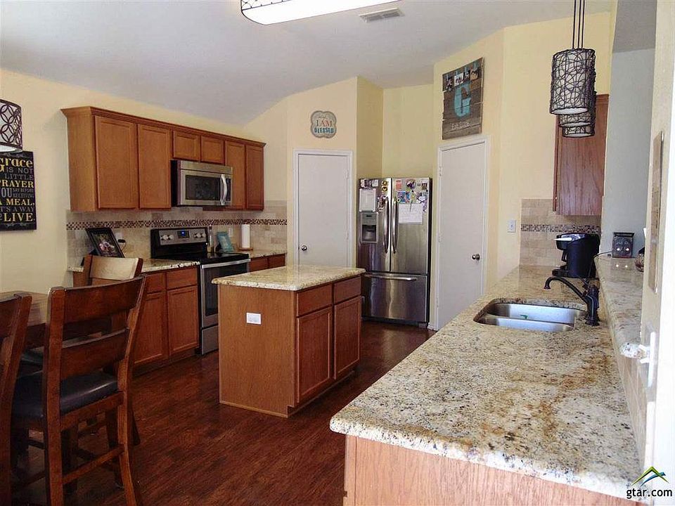 kitchen (from den), lots of granite countertops; powered isl
