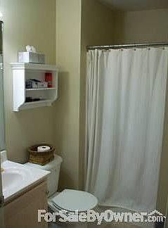 Upstairs Bathroom : Just outside the upstairs bedroom, with linen closet on other side of bathroom.