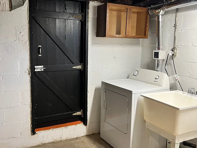 Door to attached one car garage