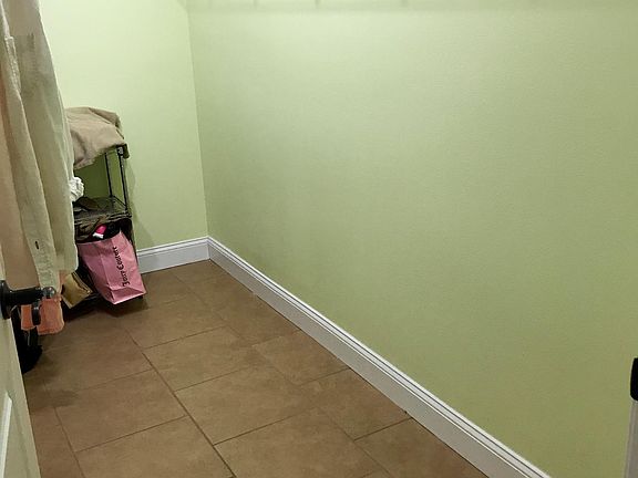 Walk-in closet in master bedroom