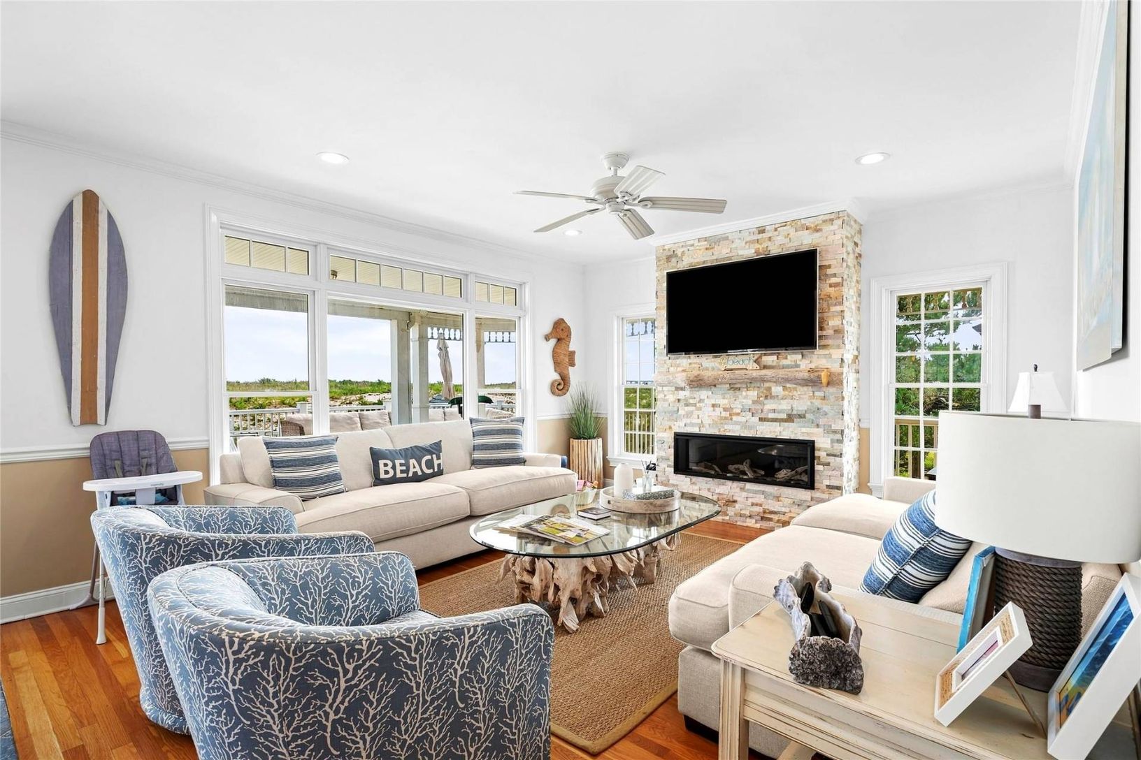  Nautical vibes living spaces with stone fireplace and stunning Oceanfront views 