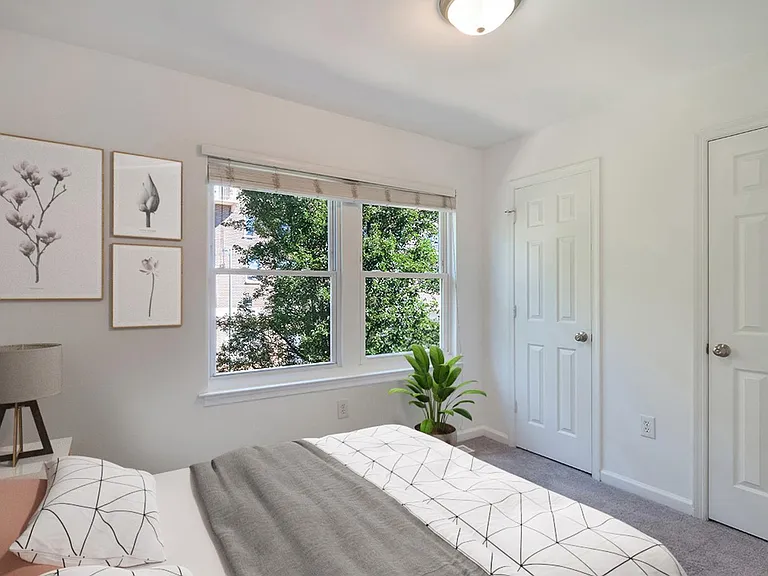 Bedroom 2. This image shows a virtually furnished space. Bedrooms come unfurnished.