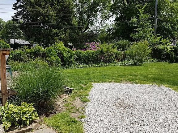 BACK YARD REAR DECK, PARKING AREA
