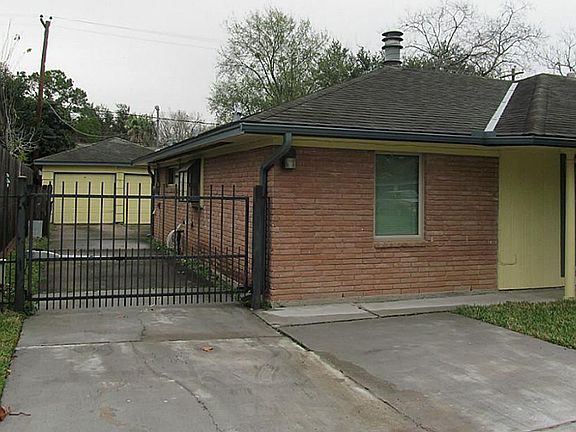 gated drive to 2 car detached garage