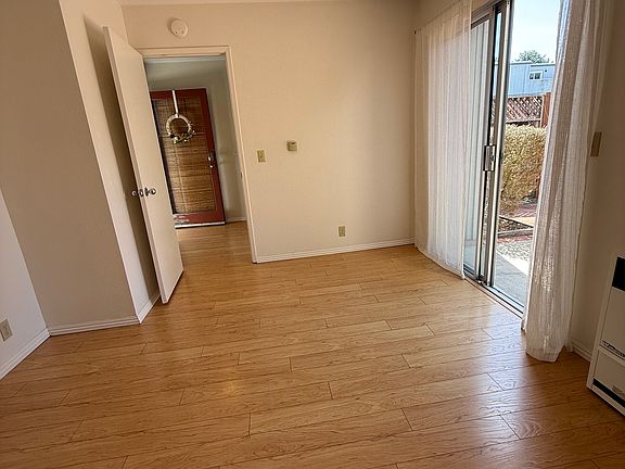 Downstairs bedroom with patio access