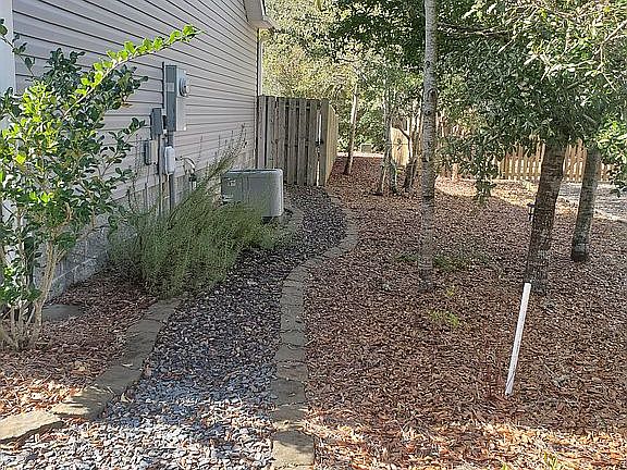 Path on left side of house