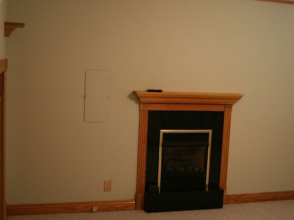Gas fireplace and entertainment center in family room