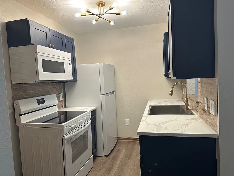 New appliances, cabinets, and flooring throughout!