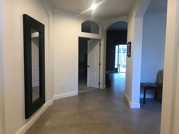 Foyer to Formal Dining Room, 5th Bedroom and Master Bedroom.