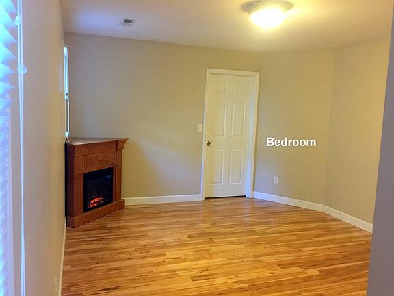 MASTER BEDROOM WITH ELECTRIC FIREPLACE