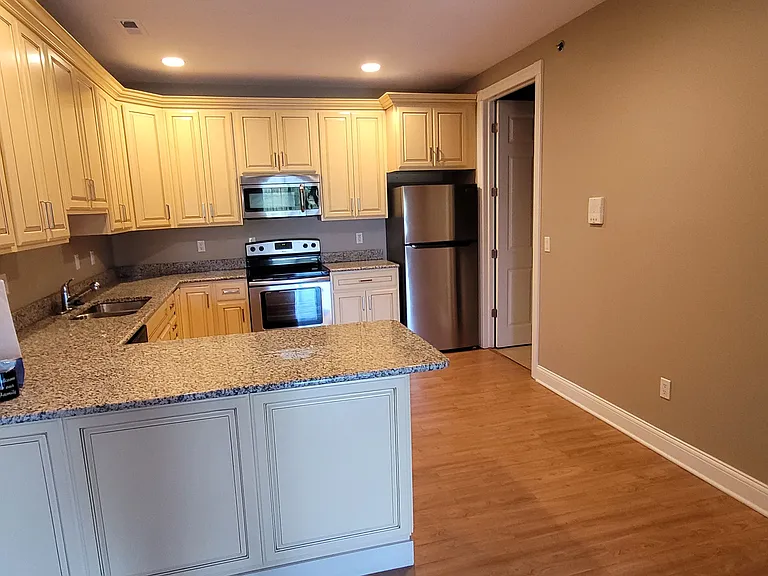 Kitchen with blonde cabinets