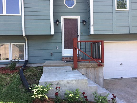 New porch railing and plants