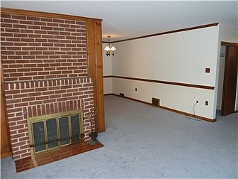 Brick Fireplace, Living Rm opens to Dining Rm.