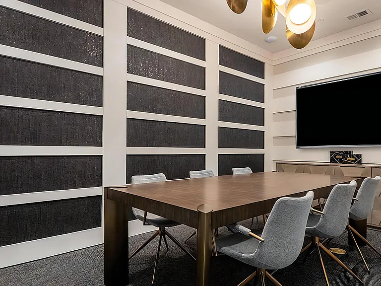 Business Center with Modern Table, Chairs, and TV Display