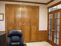 Study with French doors and plenty of built-in cabinets