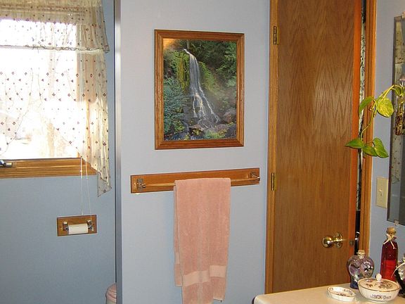 Bathroom has walk-thru to masterbedroom