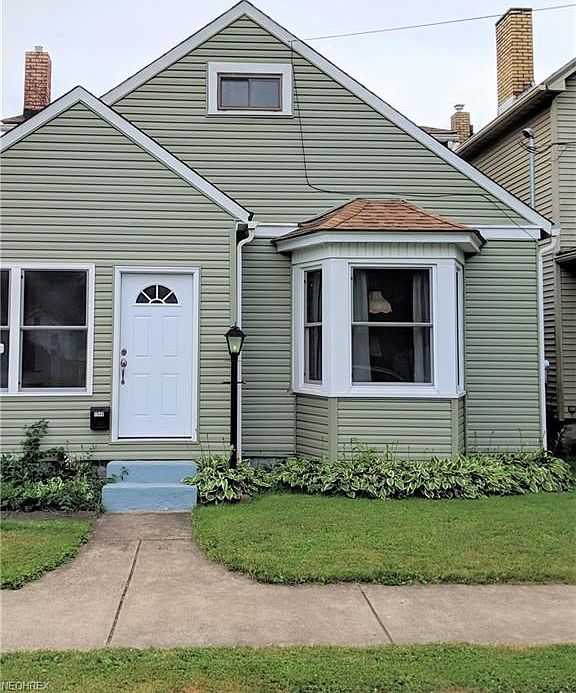 Well Maintained Cape Cod on a quiet residential street in E. Liverpool.