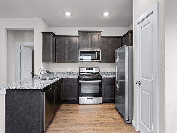 The kitchen has energy-efficient appliances.