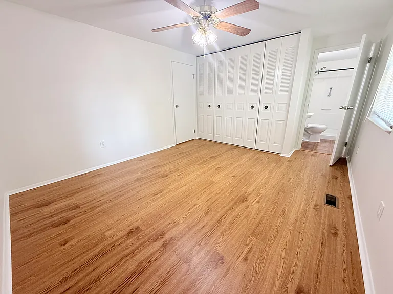 Primary suite w/ double closets and private, full bath