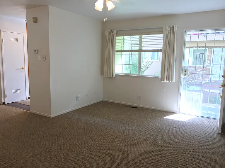 The space is bright and airy with natural lighting filling the apartment through the windows in every room, including bathroom.