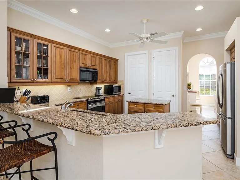 8754 Hideaway Harbor Ct — Photo 13