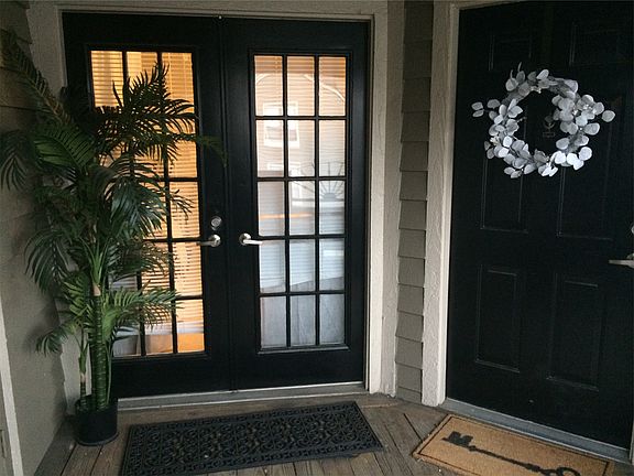 garden style patio leads to front door and double doors lead
